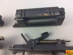 2 Triggers, 2 Bolts, 2 Springs, 2 Trigger Covers
