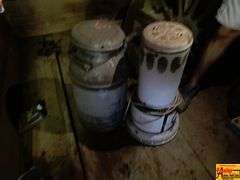 Metal Milk Can With Propane Heater