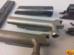 2 Triggers, 2 Bolts, 2 Springs, 2 Trigger Covers