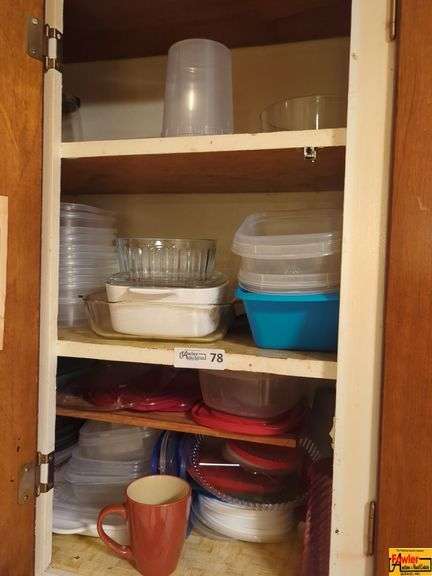 Contents Of Cabinet: Plastic Storage Containers, Casserole Bowls, Serving Bowls, Assorted Plates & Glasses image