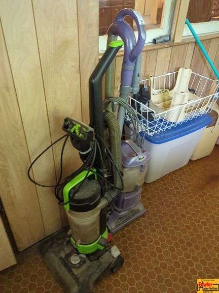 Shark and Bissell Vacuum Cleaners, Plastic Tote, Small Cooler, Step Stool, Wire Basket & Brooms image