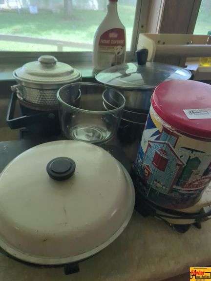 Assorted Kitchenware: Pots, Pans, and Decorative Tins image