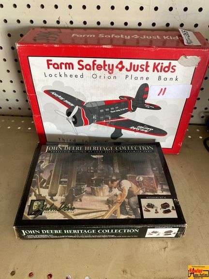 John Deere Heritage Collection - A Porcelain Replica Of John Deere's Blacksmith Shop & Lockheed Orion Plane Bank image