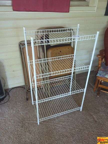 White Wire Shelving Unit with Folding Chairs image