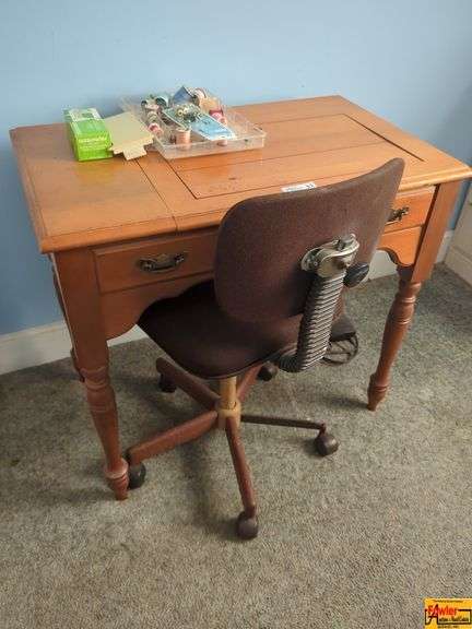 Singer Sewing Machine In Cabinet with Chair image