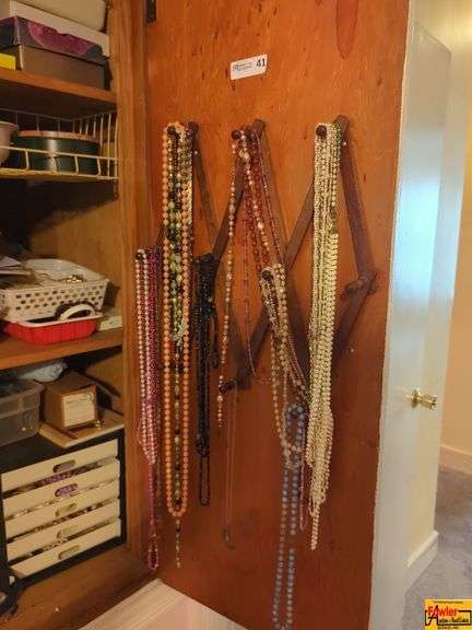 Contents Of Closet:  Beaded Necklaces and Assorted Jewelry image