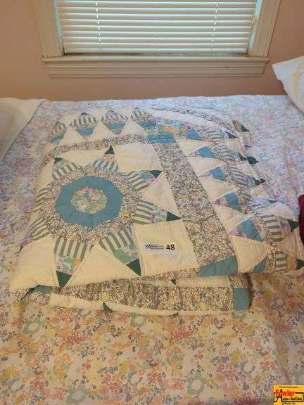 Handmade Quilt with Geometric Star Pattern image