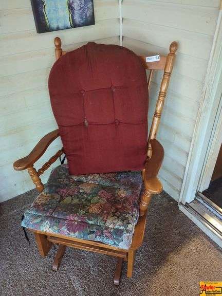 Wood Rocking Chair with Floral Cushion and Red Back Rest image