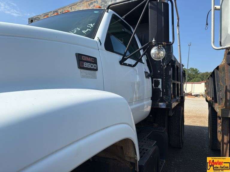 1999 GMC Dump Truck; 77,830 Miles; VIN 1GDP7H1C2XJ514465 (021668).  See video.