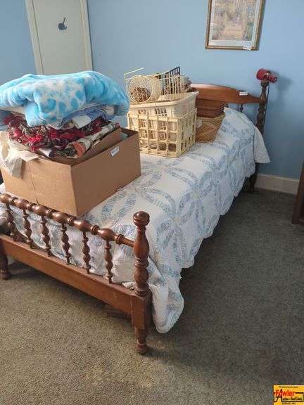 Wooden Spindle Bed with Bedding (other contents on bed are not included) image