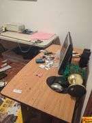 Contents Of Room:  display case, folding tables, printer, display monitor with mouse