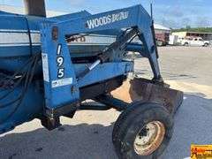 Ford 7000 Tractor with Woods DuAl loader & hay fork attachment. 3,355 hrs.  Runs good.  See video.