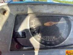 Ford 7000 Tractor with Woods DuAl loader & hay fork attachment. 3,355 hrs.  Runs good.  See video.