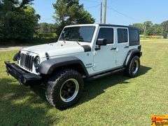 2016 Jeep Sport Wrangler Unlimited 4x4, Hard top & doors come off; Unlimited Sport Trail Rated; Only 48,000 Miles; VIN 1C4BJWDG4GL200498.  Seller offering 3-month/3,000 mile warranty.  Located at 7255 Highway 53 in Harvest, AL.  Call 601-513-7691 for more information.