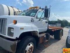 1999 GMC 7500 Flatbed Truck; 80,634 Miles; VIN 1GDM7H1C0XJ505041.  See video.