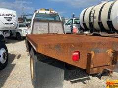 1999 GMC 7500 Flatbed Truck; 80,634 Miles; VIN 1GDM7H1C0XJ505041.  See video.