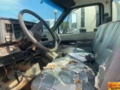 1999 GMC 7500 Flatbed Truck; 80,634 Miles; VIN 1GDM7H1C0XJ505041.  See video.