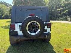 2016 Jeep Sport Wrangler Unlimited 4x4, Hard top & doors come off; Unlimited Sport Trail Rated; Only 48,000 Miles; VIN 1C4BJWDG4GL200498.  Seller offering 3-month/3,000 mile warranty.  Located at 7255 Highway 53 in Harvest, AL.  Call 601-513-7691 for more information.
