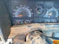 1999 GMC 7500 Flatbed Truck; 80,634 Miles; VIN 1GDM7H1C0XJ505041.  See video.