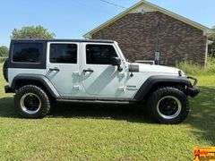 2016 Jeep Sport Wrangler Unlimited 4x4, Hard top & doors come off; Unlimited Sport Trail Rated; Only 48,000 Miles; VIN 1C4BJWDG4GL200498.  Seller offering 3-month/3,000 mile warranty.  Located at 7255 Highway 53 in Harvest, AL.  Call 601-513-7691 for more information.