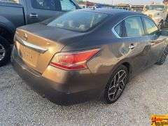 2015 Nissan Altima; 222,617 Miles; VIN 1N4AL3AP1FN873489.  See video.