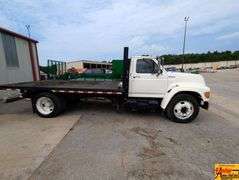 1997 Ford F-800 Flatbed, diesel, Cummins motor, Inline 6, automatic; 242,484 Miles; VIN 1FDNF82C2WVA07680.  See video.