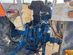 Ford 7000 Tractor with Woods DuAl loader & hay fork attachment. 3,355 hrs.  Runs good.  See video.