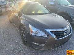 2015 Nissan Altima; 222,617 Miles; VIN 1N4AL3AP1FN873489.  See video.