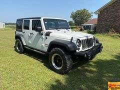2016 Jeep Sport Wrangler Unlimited 4x4, Hard top & doors come off; Unlimited Sport Trail Rated; Only 48,000 Miles; VIN 1C4BJWDG4GL200498.  Seller offering 3-month/3,000 mile warranty.  Located at 7255 Highway 53 in Harvest, AL.  Call 601-513-7691 for more information.