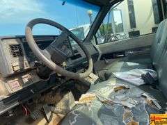 1999 GMC 7500 Flatbed Truck; 80,634 Miles; VIN 1GDM7H1C0XJ505041.  See video.