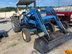 Ford 7000 Tractor with Woods DuAl loader & hay fork attachment. 3,355 hrs.  Runs good.  See video.