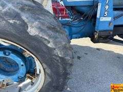 Ford 7000 Tractor with Woods DuAl loader & hay fork attachment. 3,355 hrs.  Runs good.  See video.