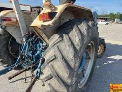 Ford 7000 Tractor with Woods DuAl loader & hay fork attachment. 3,355 hrs.  Runs good.  See video.