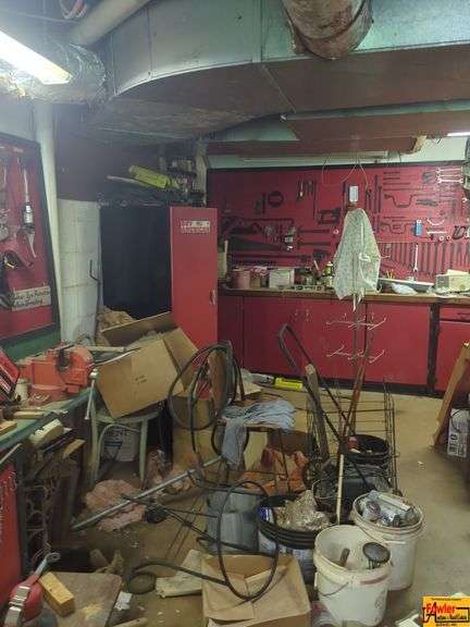 Contents Of Basement:  hand tools, tool cabinet, metal desk, fan, shop vac, shop dolly, shelves, #4 vise, automotive fluids/paint & miscellaneous shop stuff image