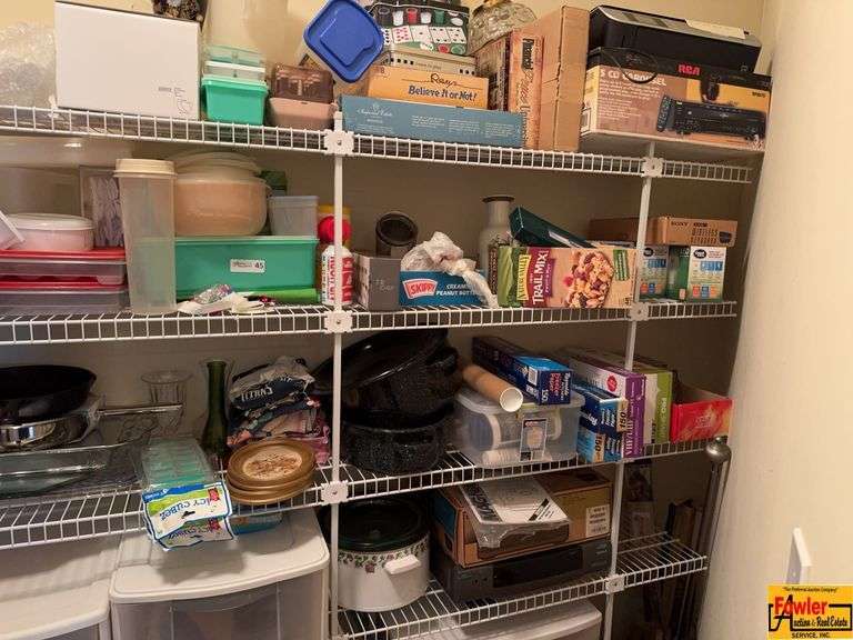 Contents Of Pantry:  plastic storageware, pans, crockpot, cleaning supplies, craft supplies & more image