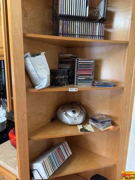 Contents Of Shelves:  CD Player, Wide Variety Of CDs image