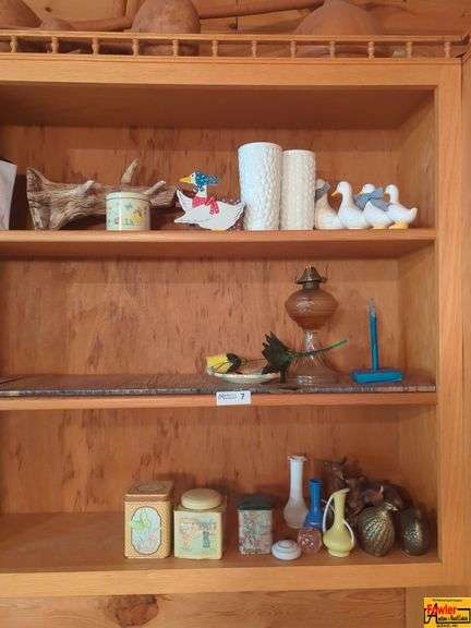Contents Of Shelf:  milk glass vases, gourds, vintage gas can, duck figurines, amber glass oil lamp base, bud vases, figurines & decorative tin cans image