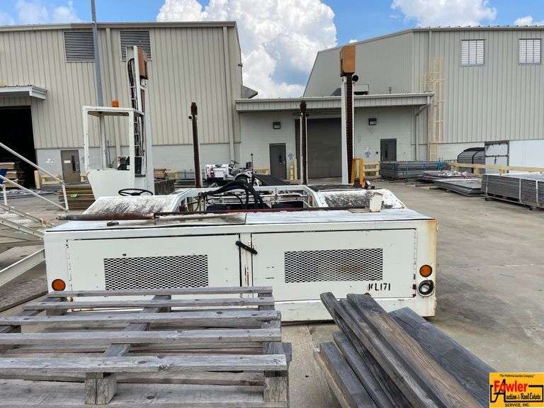 Aircraft Cargo Loader to be viewed & picked up at Huntsville's Airport Cargo Yard.  For more information, call Greg Bottom at (256) 777-4496.  Buyer is completely responsible for dismantling & moving this item. image