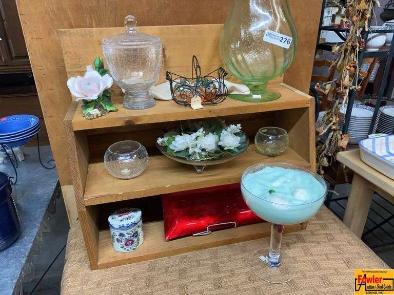 Shelf of Decorative Glassware and Home Decor image