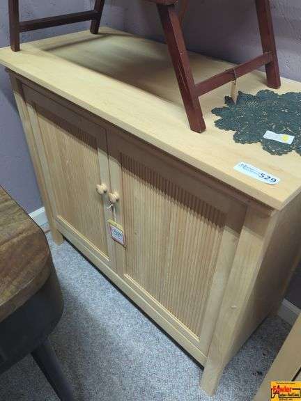 Light Wood Cabinet with Interior Shelf (Contents on Top Not Included) image