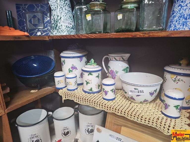 Assorted Kitchenware Lot: Colander, Canisters, Pitcher, and More image