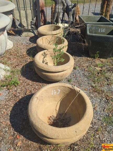 Group of Four Assorted Concrete Planters image