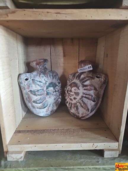 Pair of Sun Face Pottery Vessels image