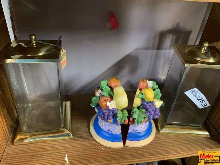 Glass Canisters with Decorative Fruit Basket Statue image