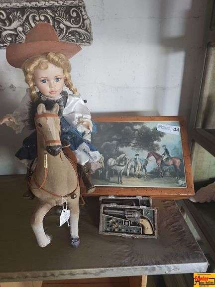 Collectible Doll on Horseback, Framed Horse Print, and Replica Revolver Set image