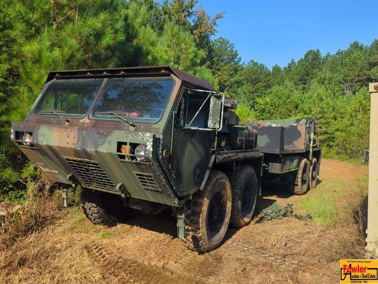 2010 Oshkosh MK-48 Military Camo 8x8 Cargo Truck With MK-15 Wrecker Trailer; VIN 10T91B2525174; starts & runs; 303 miles; both truck & trailer have Iowa titles; Works With Lot #s 16, 19, 82, 199 & 172; ; Bill Of Sale Only image