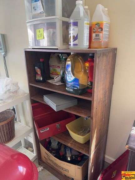 Bookshelf & Totes With Cleaning Supplies image