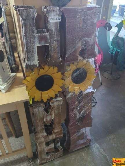 Two Decorative Wooden HOME Signs with Metal Sunflowers image