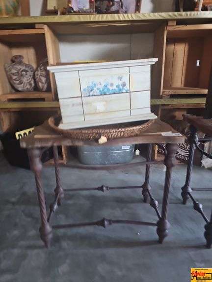 Painted Wooden Chest and Wicker Tray on Metal Leg Table image