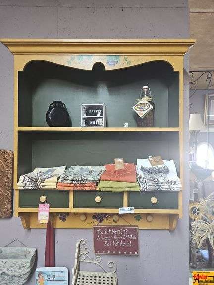 Painted Wooden Wall Shelf with Decorative Items image
